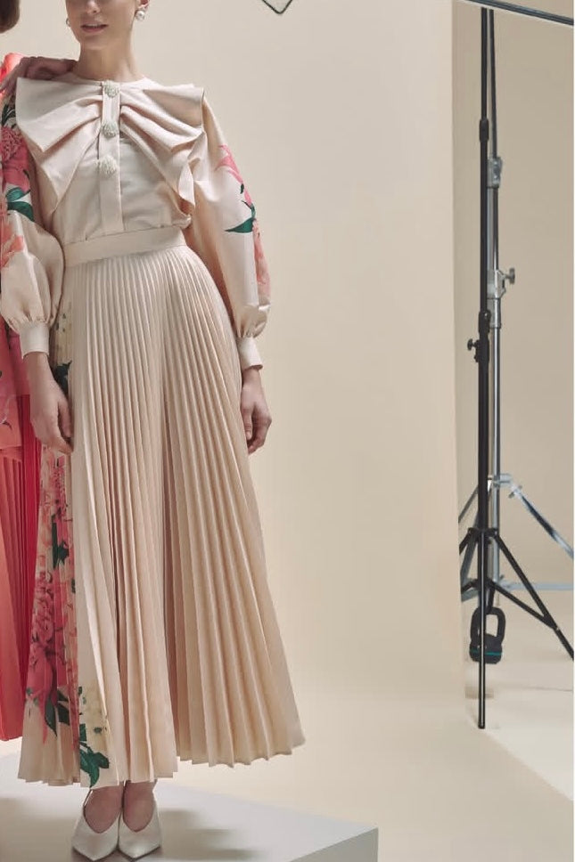 Elegant Blouse and Pleated Skirt Ensemble